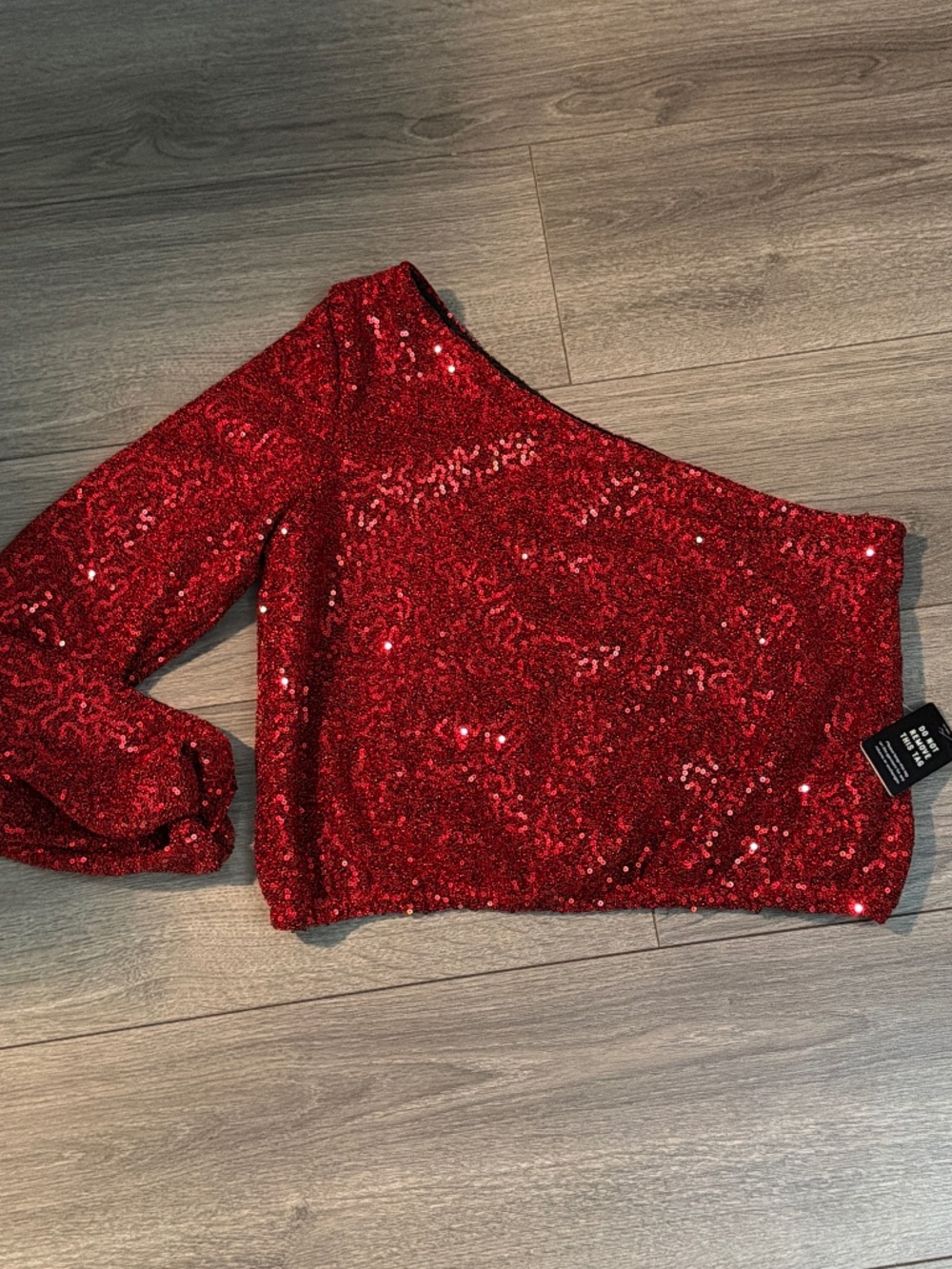 One sleeve sparkling red top